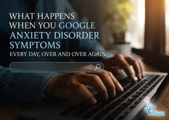Man typing on a laptop while Googling anxiety disorder symptoms